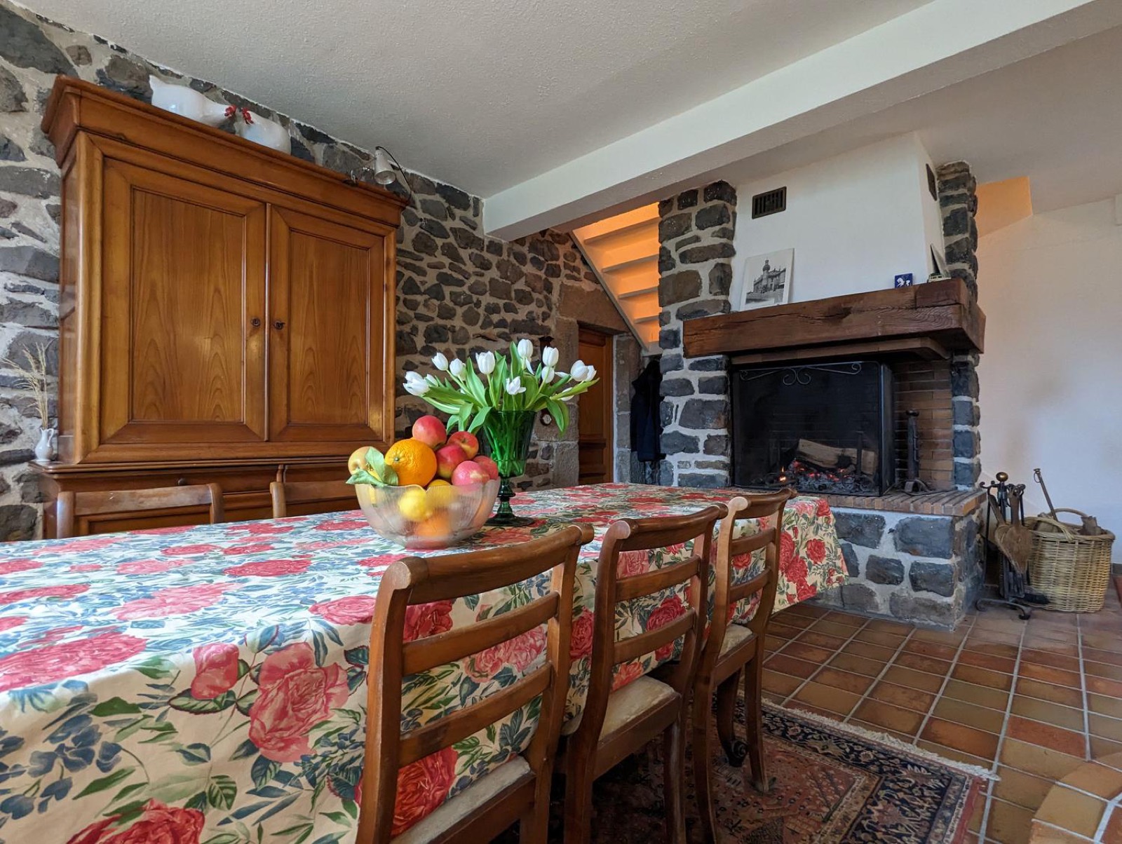 Dining room with large stone fireplace