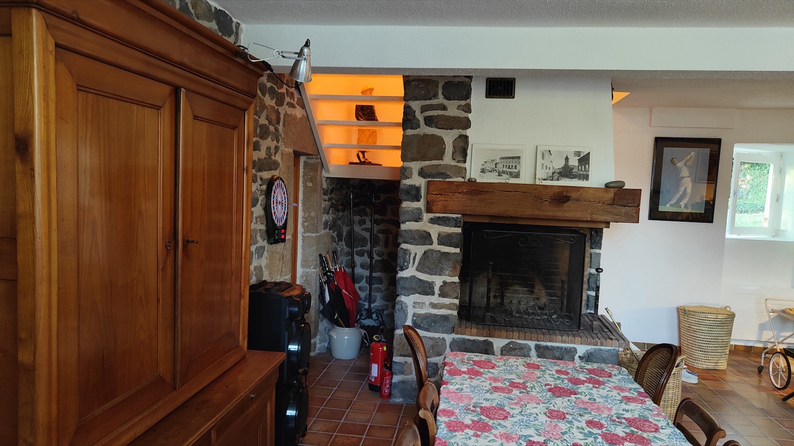 Games room with fireplace, table football and darts