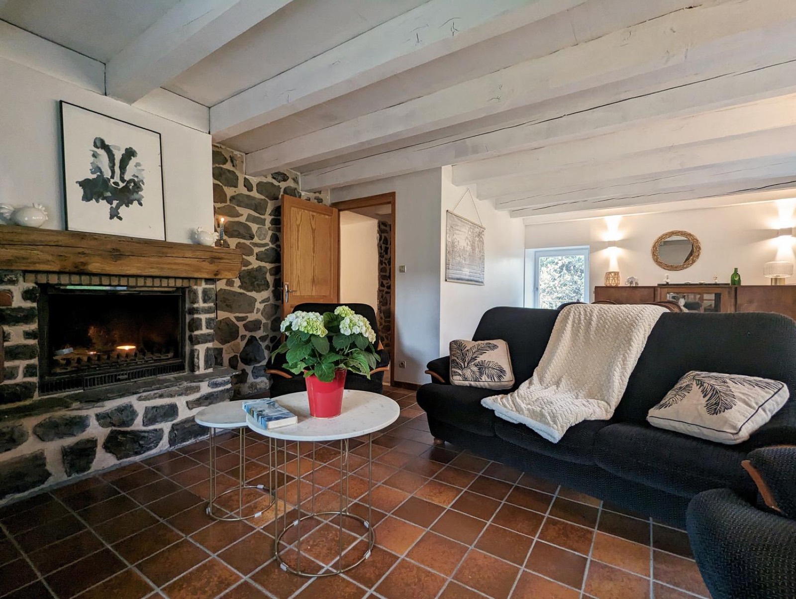 Living room with stone fireplace